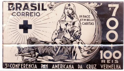Postage stamp with a nurse, the motto In pace et in bello caritas and the value 700 plus 100 réis