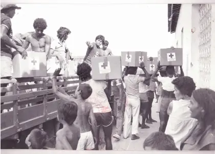 Photograph from the archive: Distribution of Brazilian Red Cross donations, with boxes marked with the red cross (1 of 2)